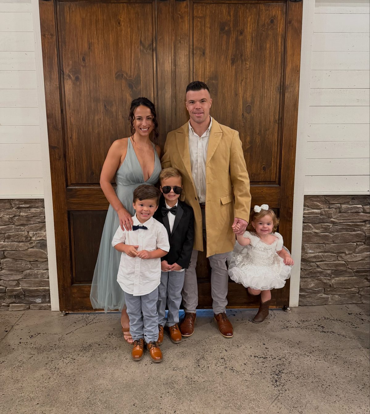 Will Carter with his wife and three kids